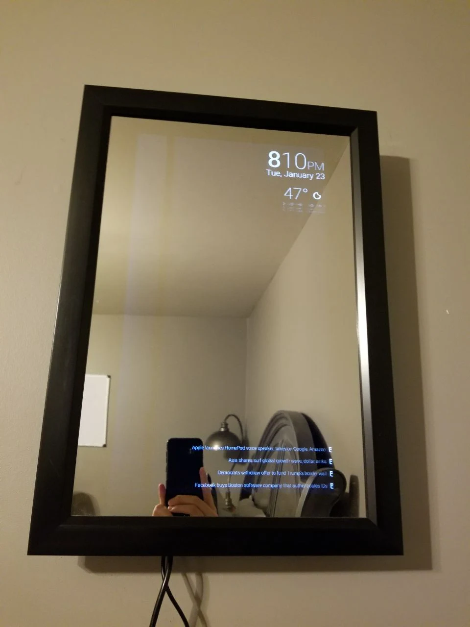 Smart Mirror hardware prototype displaying information